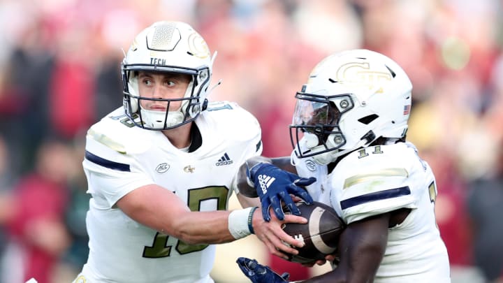 Aug 24, 2024; Dublin, IRL; Georgia Tech quarterback Haynes King hands the ball off to Jamal Haynes at Aviva Stadium. Mandatory Credit: Tom Maher/INPHO via USA TODAY Sports