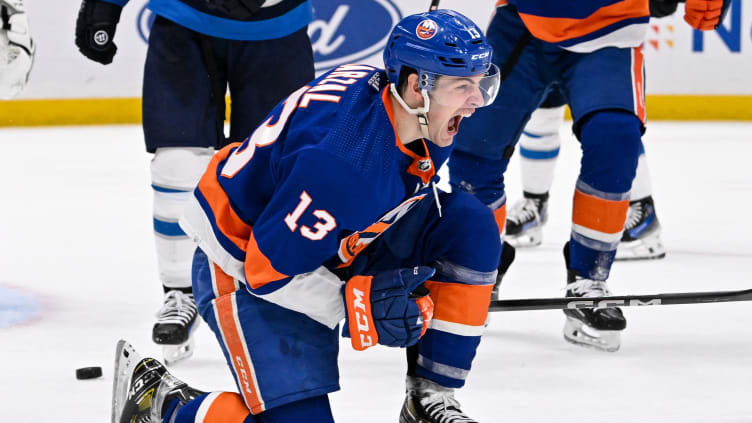 Mar 23, 2024; Elmont, New York, USA;  New York Islanders center Mathew Barzal (13) celebrates his