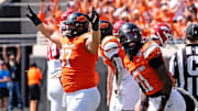 Oklahoma State's Justin Kirkland (97) celebrates a missed field goal by Arkansas in the first over time of the college football game between the Oklahoma State Cowboys and the Arkansas Razorbacks at Boone Pickens Stadium in Stillwater, Okla.,, Saturday, Sept., 7, 2024.