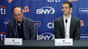 Dec 12, 2024; Flushing, NY, USA; New York Mets owner Steve Cohen speaks next to general manager David Stearns during a press conference to introduce right fielder Juan Soto at Citi Field. Mandatory Credit: Brad Penner-Imagn Images