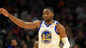 Apr 8, 2025; Phoenix, Arizona, USA; Golden State Warriors forward Jonathan Kuminga (00) against the Phoenix Suns at Footprint Center.
