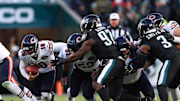 Nov 28, 2025; Philadelphia, Pennsylvania, USA; Chicago Bears quarterback Caleb Williams (18) carries the ball against the Philadelphia Eagles during the second quarter of the game at Lincoln Financial Field. Mandatory Credit: Bill Streicher-Imagn Images