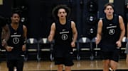 Vanderbilt’s Jason Edwards (1), Karris Bilal (0) and Chris Manon (30) warm up during an NCAA college basketball practice Tuesday, October 8, 2024, in Nashville, Tenn.