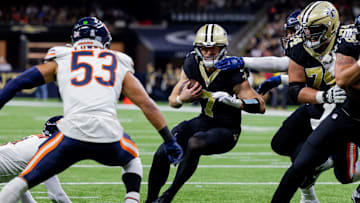 Nov 5, 2023; New Orleans, Louisiana, USA;  New Orleans Saints quarterback Taysom Hill (7) is stopped at the 1 yard line by Chicago Bears linebacker T.J. Edwards (53) during the first half at the Caesars Superdome. Mandatory Credit: Stephen Lew-Imagn Images