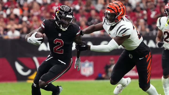 Oct 8, 2023; Glendale, Arizona, United States; Arizona Cardinals receiver Marquise Brown (2) tries to get past Cincinnati Bengals safety Jordan Battle (27) at State Farm Stadium.