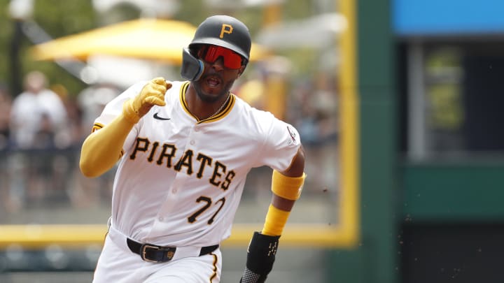 Jul 24, 2024; Pittsburgh, Pennsylvania, USA;  Pittsburgh Pirates left fielder Joshua Palacios (77) runs from first base to third base against the St. Louis Cardinals during the second inning at PNC Park. Mandatory Credit: Charles LeClaire-USA TODAY Sports