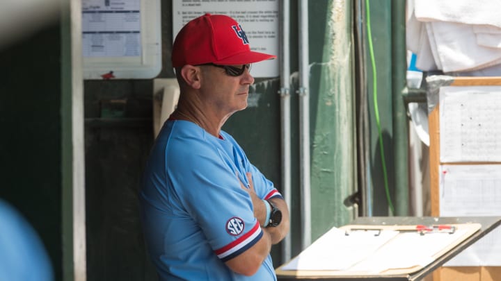 Jun 8, 2019; Fayetteville, AR, USA; Mississippi Rebels head coach Mike Bianco watches from the