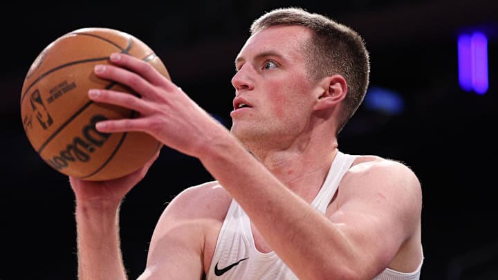 Mar 4, 2026; New York, New York, USA; Oklahoma City Thunder forward Payton Sandfort (14) warms up before the game against the New York Knicks at Madison Square Garden. Mandatory Credit: Vincent Carchietta-Imagn Images