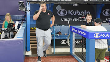 Angels general manager Perry Minasian walks out of the dugout during batting practice before a game against the Toronto Blue Jays at Rogers Centre on July 28, 2023.