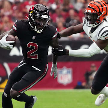 Oct 8, 2023; Glendale, Arizona, United States; Arizona Cardinals receiver Marquise Brown (2) tries to get past Cincinnati Bengals safety Jordan Battle (27) at State Farm Stadium.