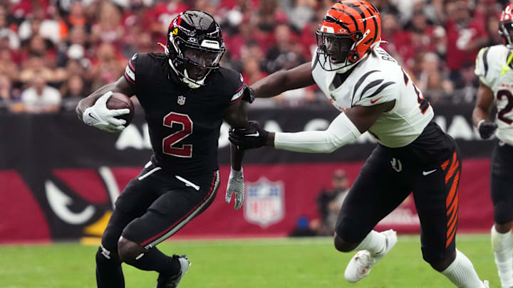 Oct 8, 2023; Glendale, Arizona, United States; Arizona Cardinals receiver Marquise Brown (2) tries to get past Cincinnati Bengals safety Jordan Battle (27) at State Farm Stadium.