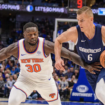 Nov 8, 2019; Dallas, TX, USA; New York Knicks forward Julius Randle (30) and Dallas Mavericks forward Kristaps Porzingis (6) in action during the game between the Mavericks and the Knicks at the American Airlines Center. Mandatory Credit: Jerome Miron-Imagn Images