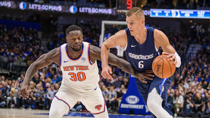 Nov 8, 2019; Dallas, TX, USA; New York Knicks forward Julius Randle (30) and Dallas Mavericks forward Kristaps Porzingis (6) in action during the game between the Mavericks and the Knicks at the American Airlines Center. Mandatory Credit: Jerome Miron-Imagn Images