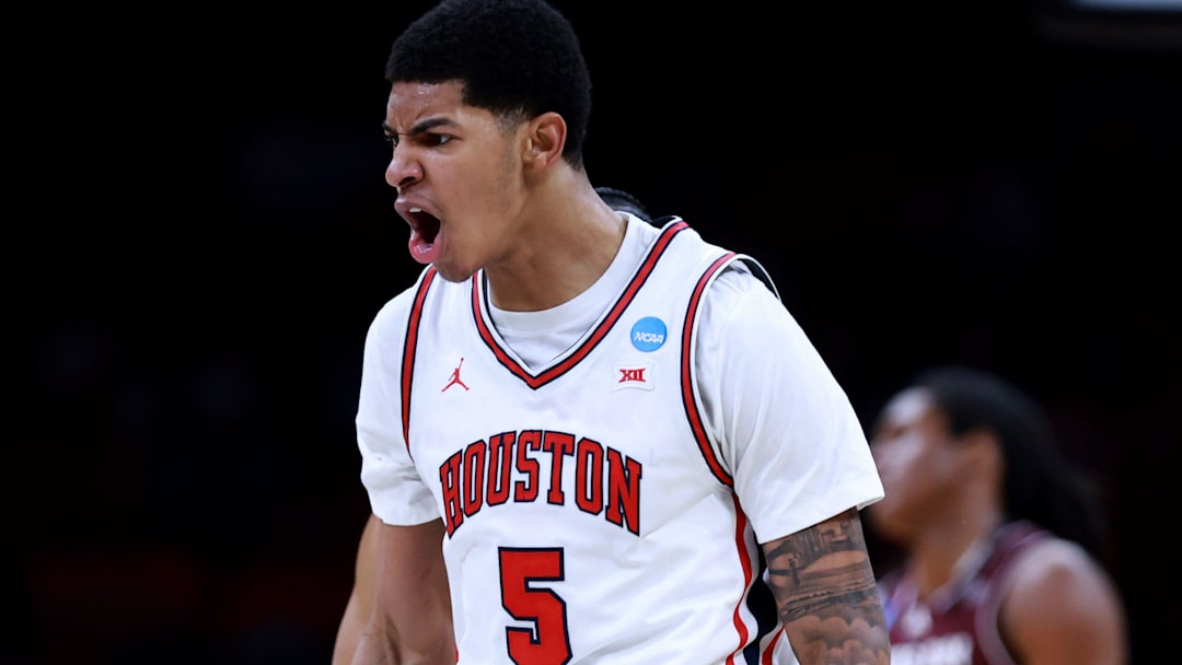 Houston's Chris Cenac Jr. cheers during a second-round game in the NCAA men's basketball tournament between Houston Cougars and Texas A&M Aggies at Paycom Center in Oklahoma City, Saturday March 21, 2026. Houston's Chris Cenac Jr. cheers during a second-round game in the NCAA men's basketball tournament between Houston Cougars and Texas A&M Aggies at Paycom Center in Oklahoma City, Saturday March 21, 2026.