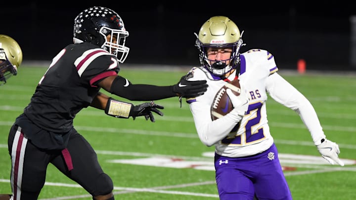 Austin Ariola (22) carries the ball for CBA Syracuse in the 2024 New York State Class AA playoffs.