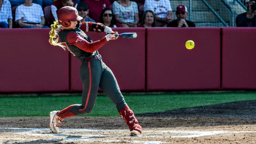 Oklahoma infielder Sydney Barker hits a ball against Sam Houston.
