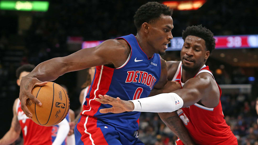 Nov 27, 2024; Memphis, Tennessee, USA; Detroit Pistons center Jalen Duren (0) dribbles as Memphis Grizzlies forward Jaren Jackson Jr. (13) defends during the first half at FedExForum. Mandatory Credit: Petre Thomas-Imagn Images