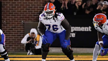 Nov 18, 2023; Columbia, Missouri, USA; Florida Gators offensive lineman Damieon George Jr. (76) at the line of scrimmage against the Missouri Tigers during the game at Faurot Field at Memorial Stadium. Mandatory Credit: Denny Medley-Imagn Images