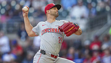 Sep 9, 2024; Cumberland, Georgia, USA; Cincinnati Reds starting pitcher Nick Martinez (28) pitches against the Atlanta Braves during the first inning at Truist Park. Mandatory Credit: Dale Zanine-Imagn Images