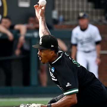 Cam Allen (42) throws to a Vanderbilt batter during the first inning of the Nashville Regional.