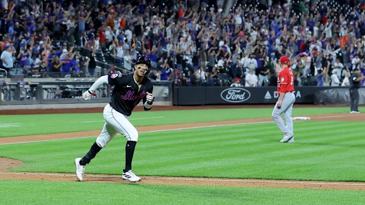 New York Mets third baseman Mark Vientos (27) rounds the bases after hitting a tenth inning walkoff two run home run against Cincinnati Reds relief pitcher Justin Wilson (32) at Citi Field on Sept 6.