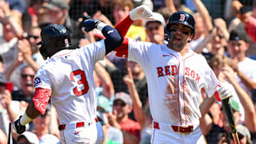 Jul 13, 2025; Boston, Massachusetts, USA; Boston Red Sox outfielder Ceddanne Rafaela (3) celebrates with third base Marcelo Mayer (39) after hitting a two-run home run against the Tampa Bay Rays during the sixth inning  at Fenway Park. Mandatory Credit: Brian Fluharty-Imagn Images