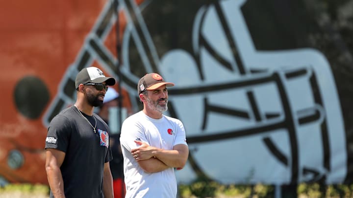 Browns general manager Andrew Berry, left, and head coach Kevin Stefanski watch practice during minicamp, Thursday, June 13, 2024, in Berea.