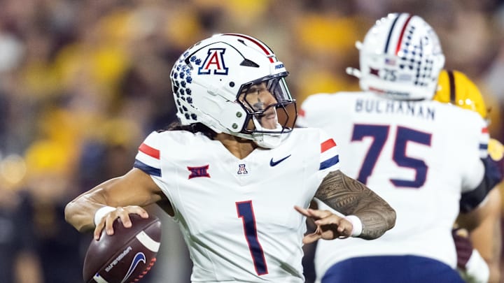 Nov 28, 2025; Tempe, Arizona, USA; Arizona Wildcats quarterback Noah Fifita (1) against the Arizona State Sun Devils in the first half during the 99th Territorial Cup at Mountain America Stadium. Mandatory Credit: Mark J. Rebilas-Imagn Images