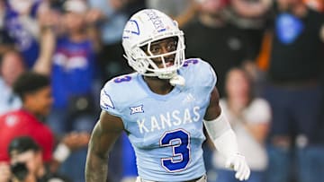 Aug 29, 2024; Kansas City, Kansas, USA; Kansas Jayhawks cornerback Mello Dotson (3) celebrates after returning an interception for a touchdown during the first half against the Lindenwood Lions at Children's Mercy Park. Mandatory Credit: Jay Biggerstaff-Imagn Images