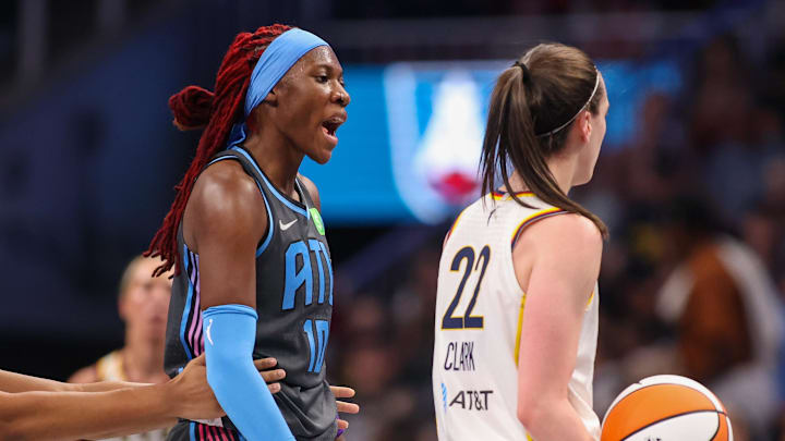 May 22, 2025; Atlanta, Georgia, USA; Atlanta Dream guard Rhyne Howard (10) gets in the face of Indiana Fever guard Caitlin Clark (22) in the first half at State Farm Arena. Mandatory Credit: Brett Davis-Imagn Images

