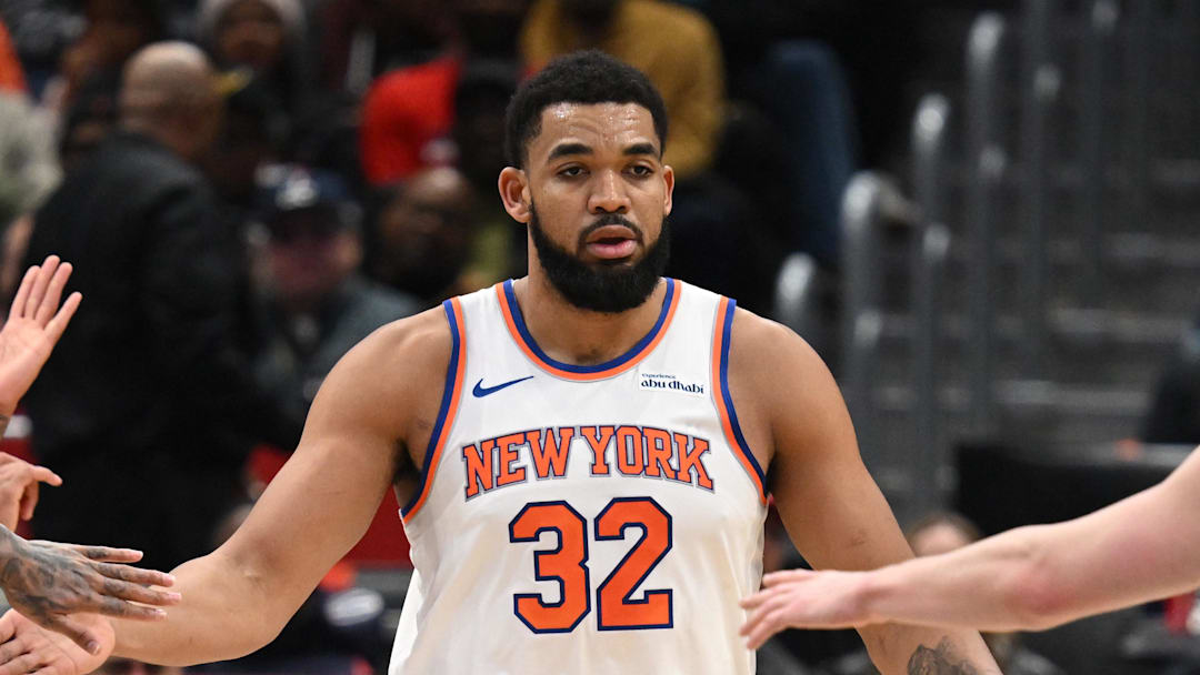 Feb 3, 2026; Washington, District of Columbia, USA; New York Knicks center Karl-Anthony Towns (32) celebrates a play with guard Jordan Clarkson (00) and guard Tyler Kolek (13) against the Washington Wizards during the second quarter at Capital One Arena. Mandatory Credit: Rafael Suanes-Imagn Images