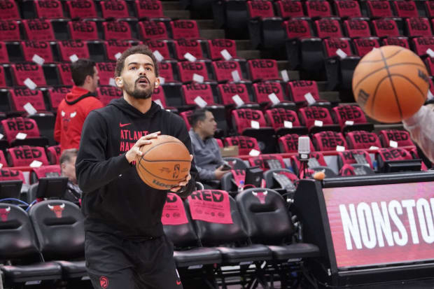 Atlanta Hawks guard Trae Young (11) warms up before a play-in game of the 2024 NBA playoffs against the Chicago Bulls.