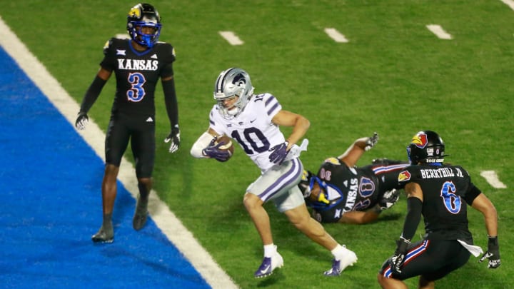 Kansas State sophomore wide receiver Kegan Johnson (10) runs in for a touchdown after making a pass in the second quarter of Saturday's Sunflower Showdown against Kansas State inside David Booth Kansas Memorial Stadium.