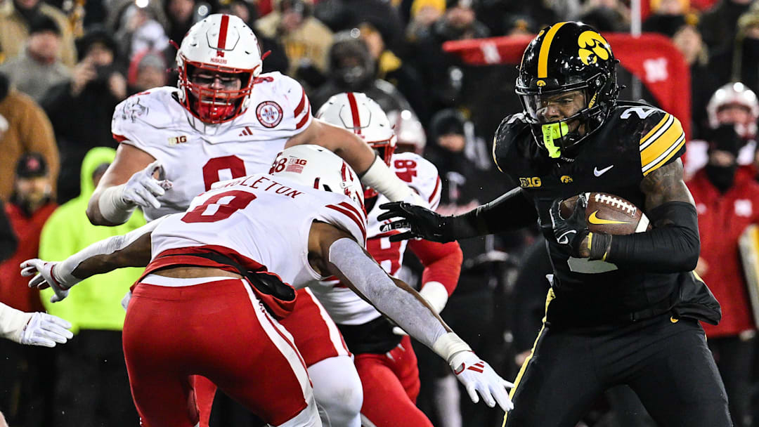 Iowa running back Kaleb Johnson runs the ball as Nebraska defensive back DeShon Singleton looks to make the tackle last season in Iowa City.