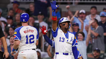 Atlanta Braves catcher Sean Murphy celebrates with MLB star Ronald Acuna Jr. after scoring against the New York Yankees