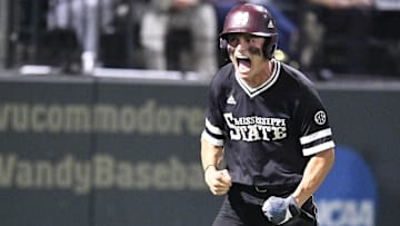 June 10, 2018; Nashville, TN, USA; Mississippi St. center fielder Jake Mangum (15) celebrates after scoring to make the score, 6-3, in the ninth inning at the NCAA Super Regional at Hawkins Field. Mandatory Credit: George Walker IV/The Tennessean via USA TODAY NETWORK