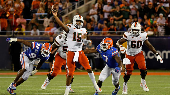 Aug 24, 2019; Orlando, FL, USA; Miami Hurricanes quarterback Jarren Williams (15) attempts a pass against the Florida Gators during the second half at Camping World Stadium. Mandatory Credit: Jasen Vinlove-USA TODAY Sports