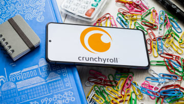 In this photo illustration, a Crunchyroll logo seen...