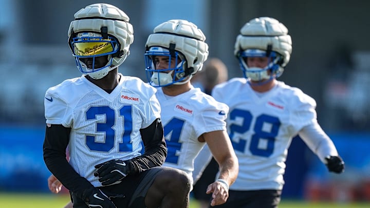 Detroit Lions safety Kerby Joseph (31), center, practices during training camp at Meijer Performance Center in Allen Park on Monday, July 21, 2025.