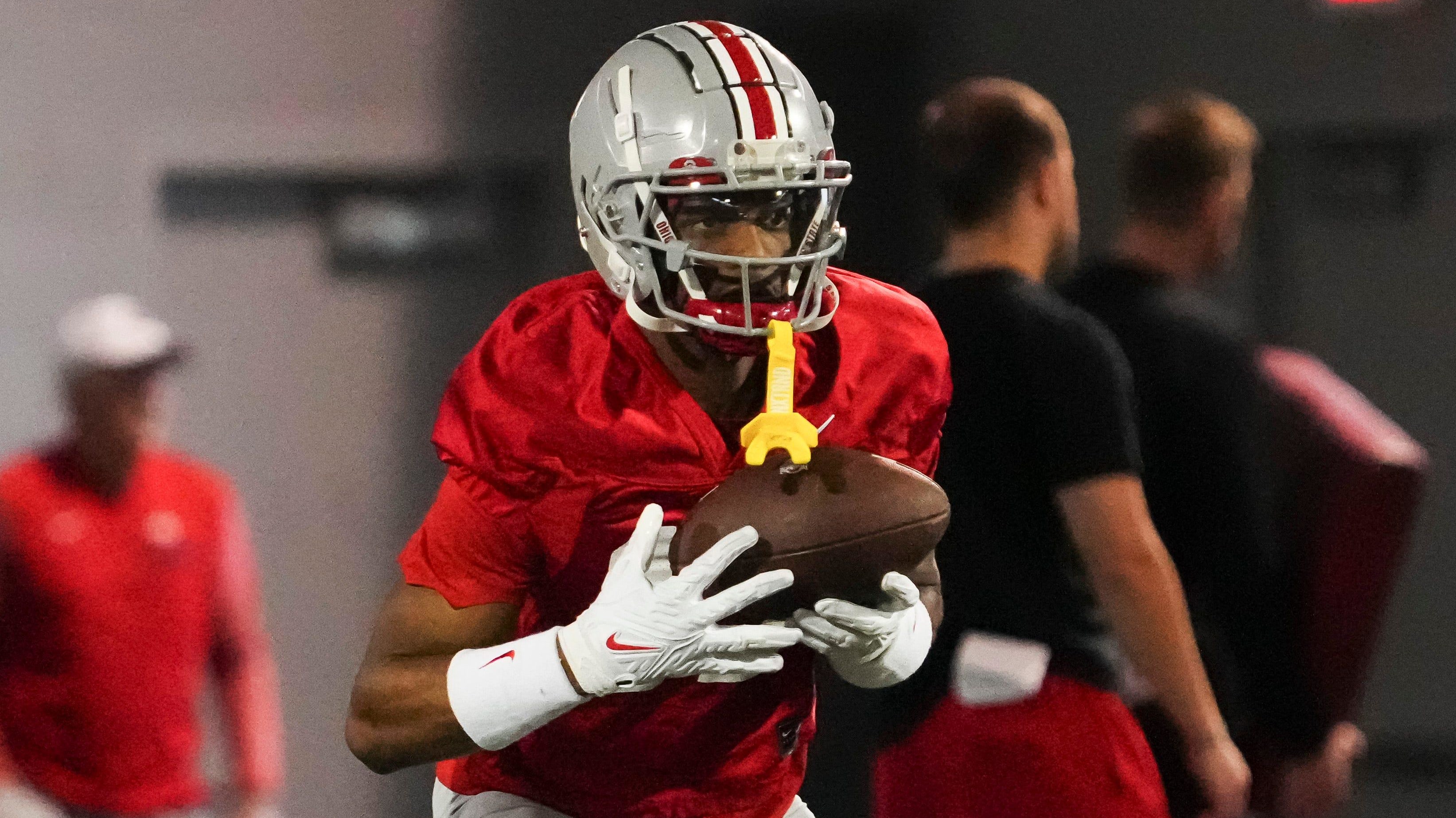 Ohio State Buckeyes wide receiver Carnell Tate in action during college football spring practice.