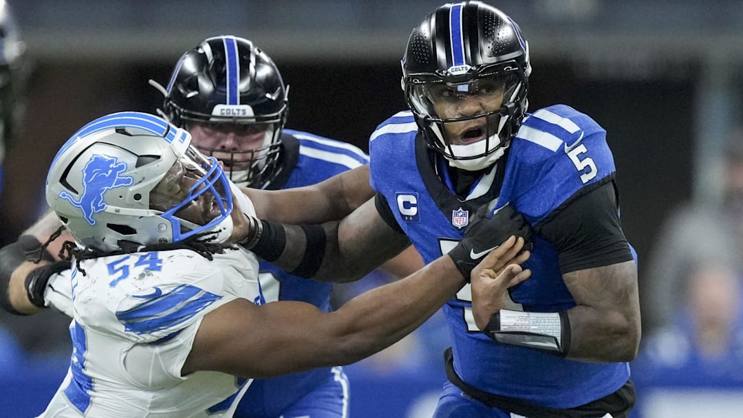 Nov 24, 2024; Indianapolis, Indiana, USA; Detroit Lions defensive tackle Alim McNeill (54) causes Indianapolis Colts quarterback Anthony Richardson (5) to fumble the ball during a game against the Detroit Lions at Lucas Oil Stadium. Nov 24, 2024; Indianapolis, Indiana, USA; Detroit Lions defensive tackle Alim McNeill (54) causes Indianapolis Colts quarterback Anthony Richardson (5) to fumble the ball during a game against the Detroit Lions at Lucas Oil Stadium.