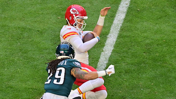 Patrick Mahomes slides during the Chiefs' 38–35 win over the Eagles in Super Bowl LVII on Feb. 12, 2023.