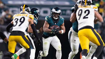 Dec 15, 2024; Philadelphia, Pennsylvania, USA; Philadelphia Eagles running back Saquon Barkley (26) runs with the ball against the Pittsburgh Steelers during the fourth quarter at Lincoln Financial Field.