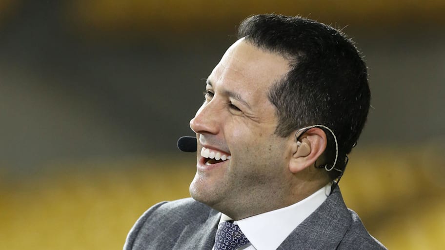 ESPN's Adam Schefter will extend his coverage to the golf world at this weekend's Travelers Championship. | Charles LeClaire-Imagn Images