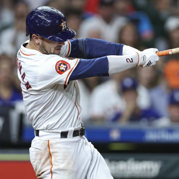 Jul 27, 2024; Houston, Texas, USA; Houston Astros third baseman Alex Bregman (2) hits a walk-off home run during the ninth inning against the Los Angeles Dodgers at Minute Maid Park.