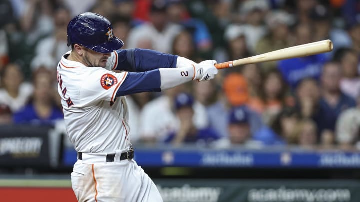 Jul 27, 2024; Houston, Texas, USA; Houston Astros third baseman Alex Bregman (2) hits a walk-off home run during the ninth inning against the Los Angeles Dodgers at Minute Maid Park. Mandatory Credit: Troy Taormina-USA TODAY Sports