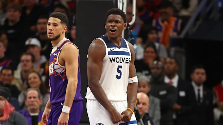 Jan 29, 2025; Phoenix, Arizona, USA; Minnesota Timberwolves guard Anthony Edwards (5) reacts after a basket against the Phoenix Suns in the second half at Footprint Center. Mandatory Credit: Mark J. Rebilas-Imagn Images