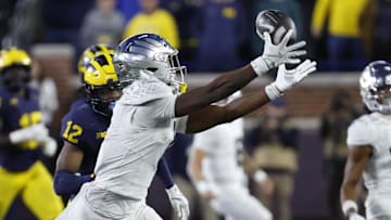 Nov 2, 2024; Ann Arbor, Michigan, USA;  Oregon Ducks wide receiver Traeshon Holden (1) makes a reception in the second half against the Michigan Wolverines at Michigan Stadium. Mandatory Credit: Rick Osentoski-Imagn Images