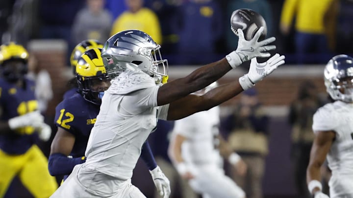 Nov 2, 2024; Ann Arbor, Michigan, USA;  Oregon Ducks wide receiver Traeshon Holden (1) makes a reception in the second half against the Michigan Wolverines at Michigan Stadium. Mandatory Credit: Rick Osentoski-Imagn Images