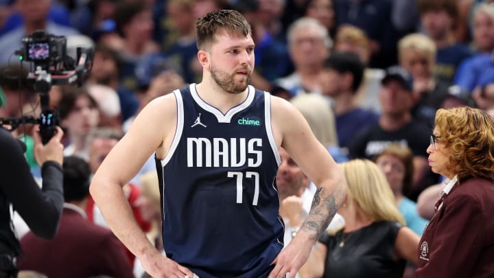 Dallas Mavericks guard Luka Doncic (77) reacts after fouling out of the game against the Boston Celtics during the fourth quarter during game three of the 2024 NBA Finals at American Airlines Center. Mandatory Credit: